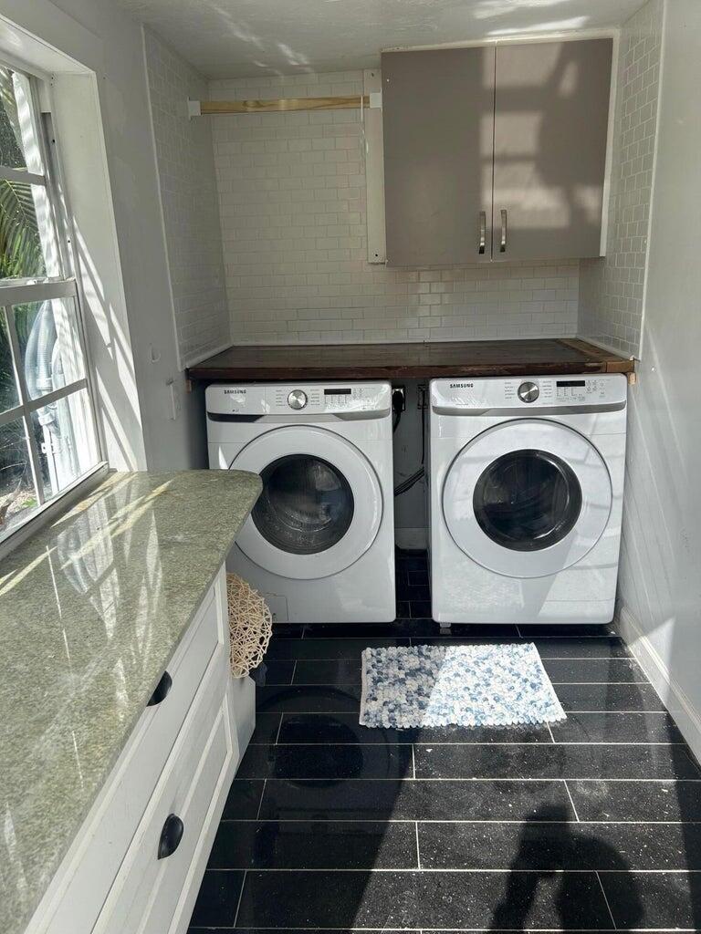 820 30th Street West Palm Beach, FL 33407 - Photo 14 of 40 a utility room with dryer and washer