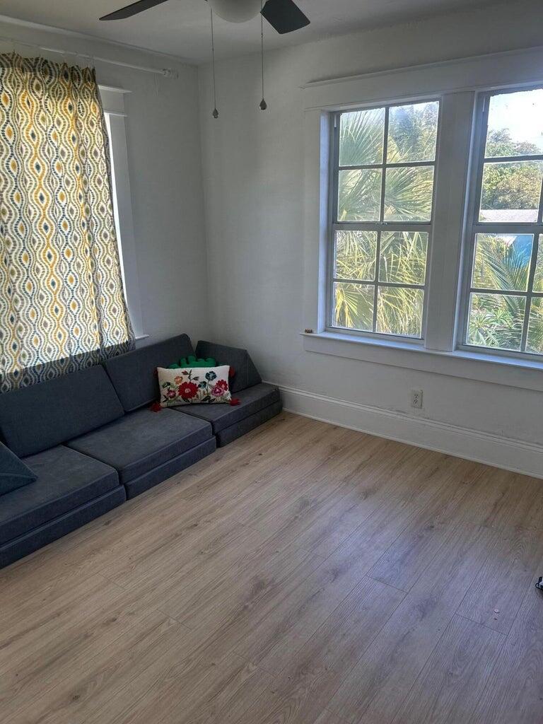 820 30th Street West Palm Beach, FL 33407 - Photo 24 of 40 a living room with furniture and a window