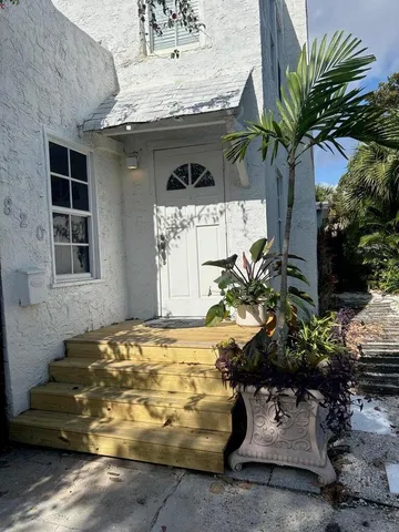 a vase of flowers sitting on a table