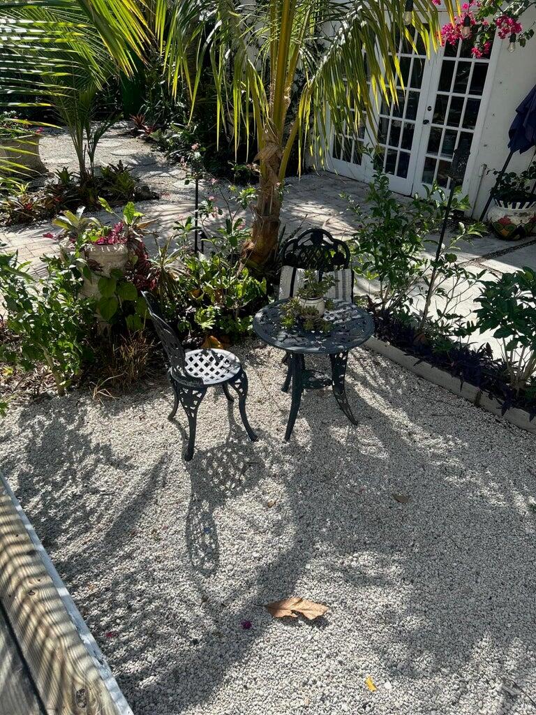 820 30th Street West Palm Beach, FL 33407 - Photo 31 of 40 a view of a backyard with sitting area