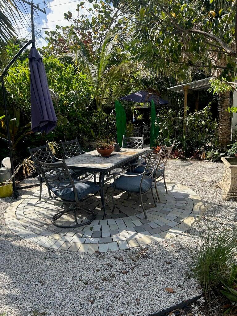 820 30th Street West Palm Beach, FL 33407 - Photo 35 of 40 a view of a backyard with sitting area