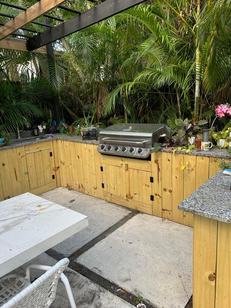 820 30th Street West Palm Beach, FL 33407 - Photo 39 of 40 a view of swimming pool with a patio