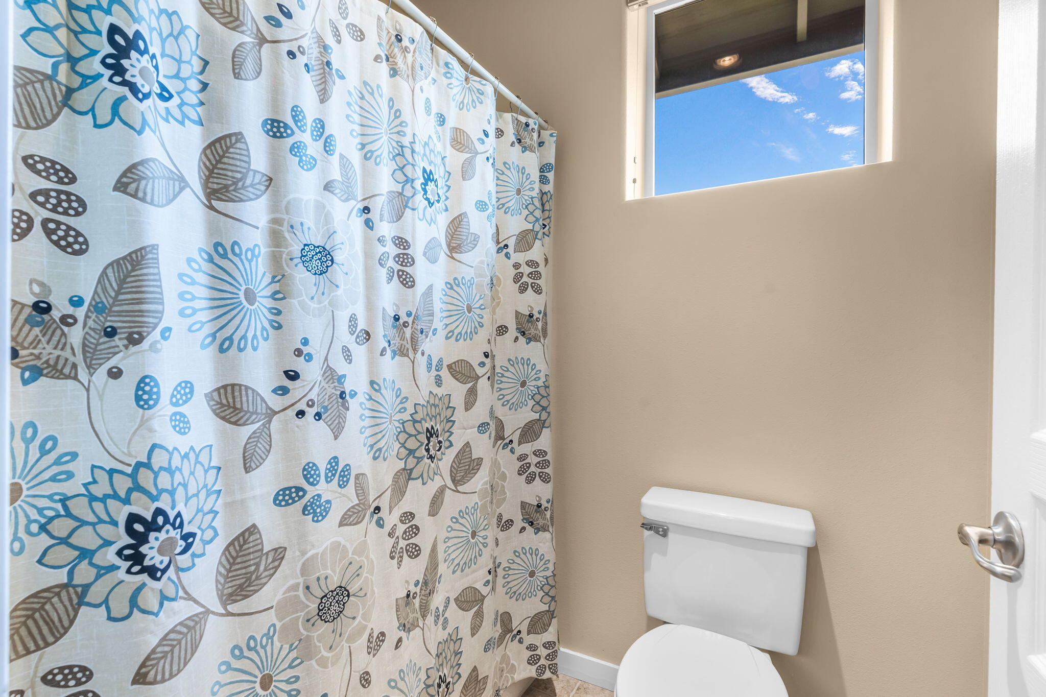 10870 Village Loop Redmond, OR 97756 - Photo 23 of 35 a white toilet sitting next to a shower curtain