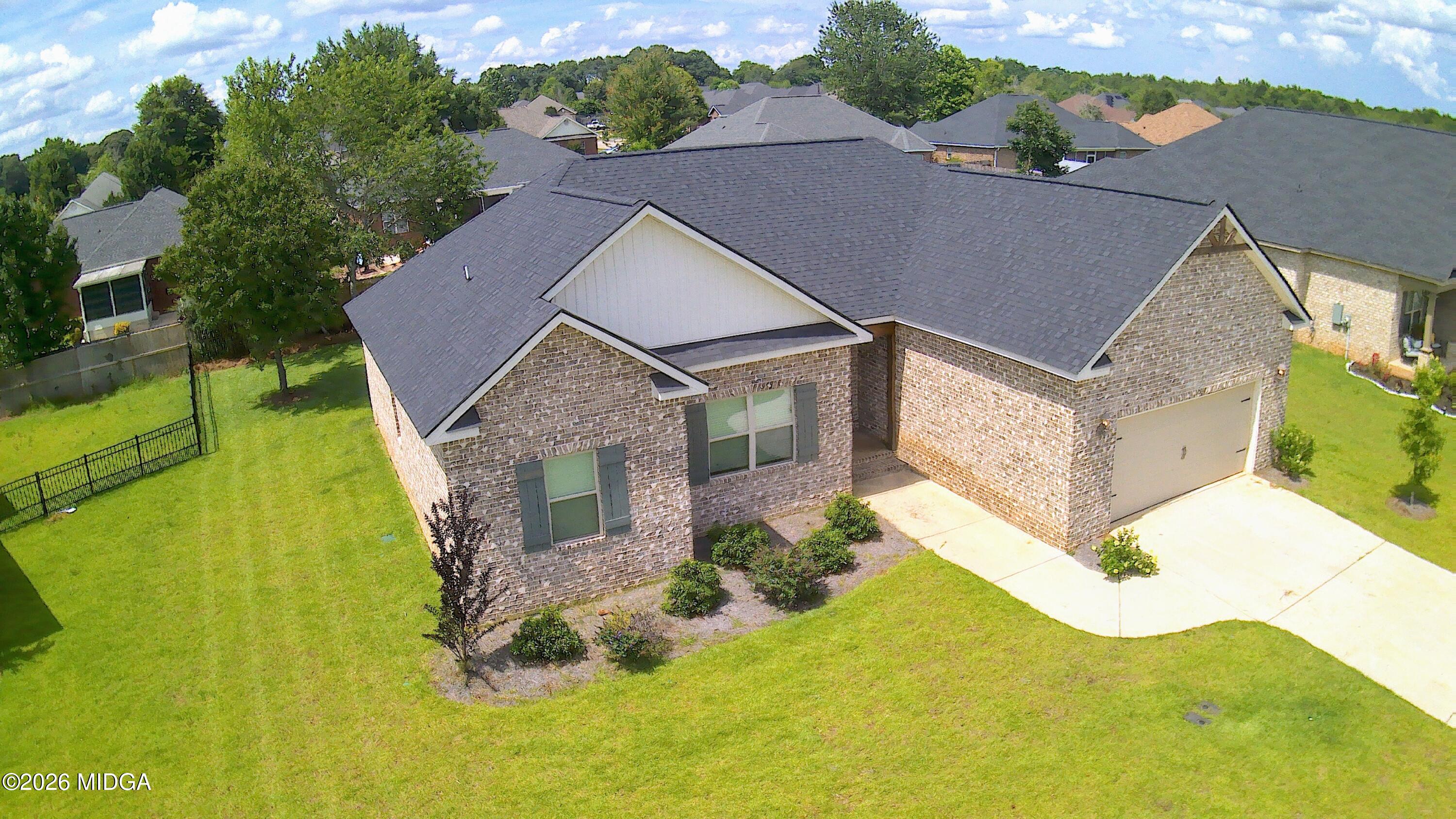 106 Raspberry Trail Perry, GA 31069 - Photo 29 of 42 a aerial view of a house with a yard