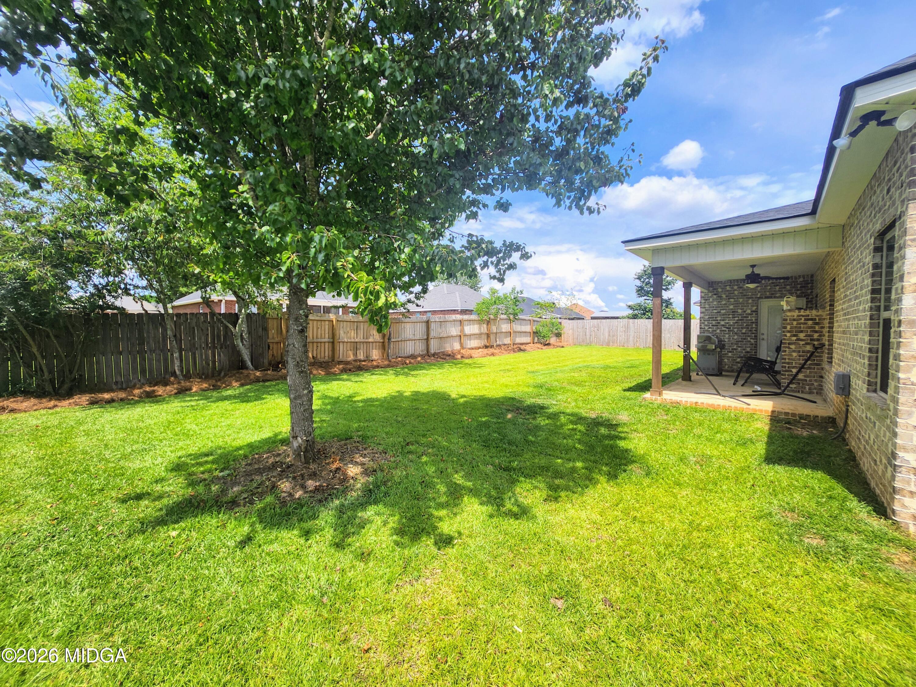 106 Raspberry Trail Perry, GA 31069 - Photo 42 of 42 a view of a yard with a slide