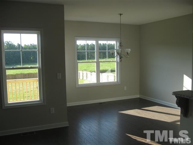 10894 Selma Road Middlesex, NC 27557 - Photo 5 of 12 a room with furniture and a window