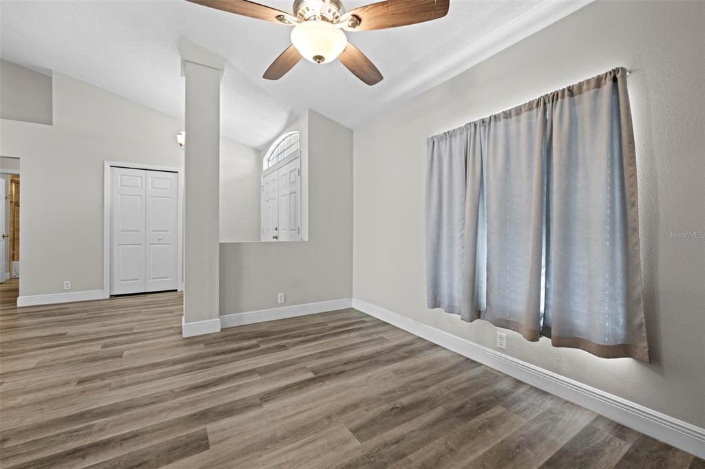 8155 Giffen Lane Spring Hill, FL 34608 - Photo 28 of 52 a view of an entryway with wooden floor