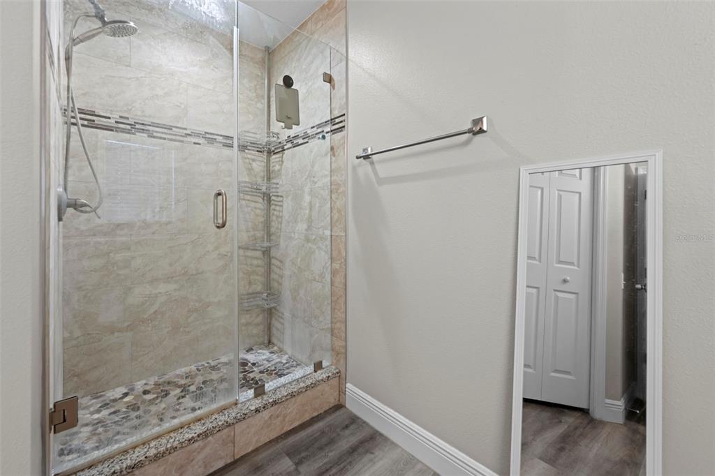 8155 Giffen Lane Spring Hill, FL 34608 - Photo 29 of 52 a bathroom with a shower