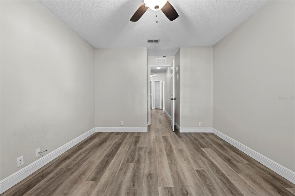 8155 Giffen Lane Spring Hill, FL 34608 - Photo 35 of 52 a view of room with ceiling fan and window