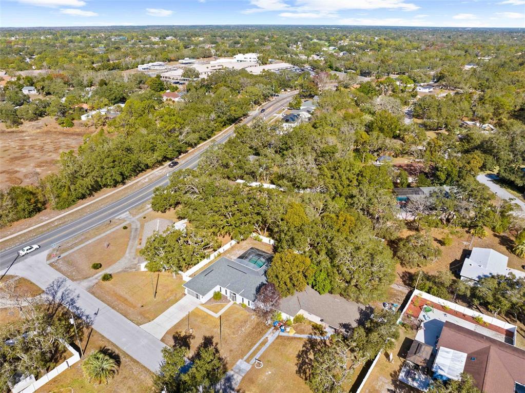 8155 Giffen Lane Spring Hill, FL 34608 - Photo 47 of 52 an aerial view of residential houses with outdoor space