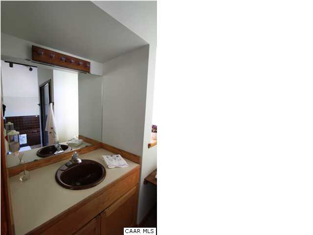 2525 Ridge Road Charlottesville, VA 22901 - Photo 13 of 33 a view of a bathroom with a sink and a mirror
