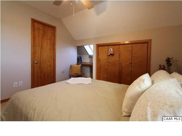 2525 Ridge Road Charlottesville, VA 22901 - Photo 14 of 33 a bedroom with a bed and a mirror