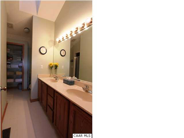 2525 Ridge Road Charlottesville, VA 22901 - Photo 16 of 33 a bathroom with a double vanity sink mirror and double