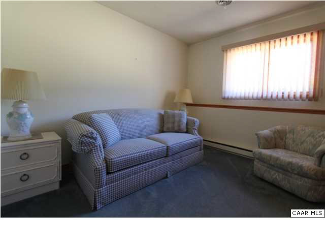 2525 Ridge Road Charlottesville, VA 22901 - Photo 32 of 33 a living room with furniture and a large window