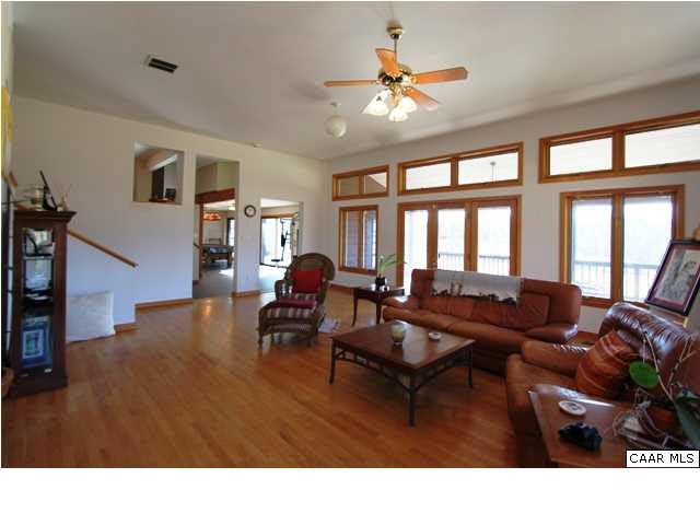 2525 Ridge Road Charlottesville, VA 22901 - Photo 9 of 33 a living room with furniture dining table and a large window