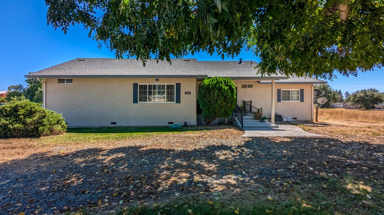 24318 North Graham Road Acampo, CA 95220 - Photo 1 of 1 a view of a house with a yard