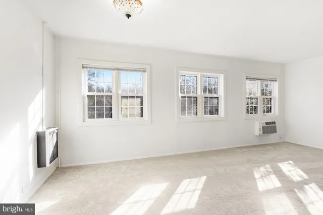 an empty room with windows