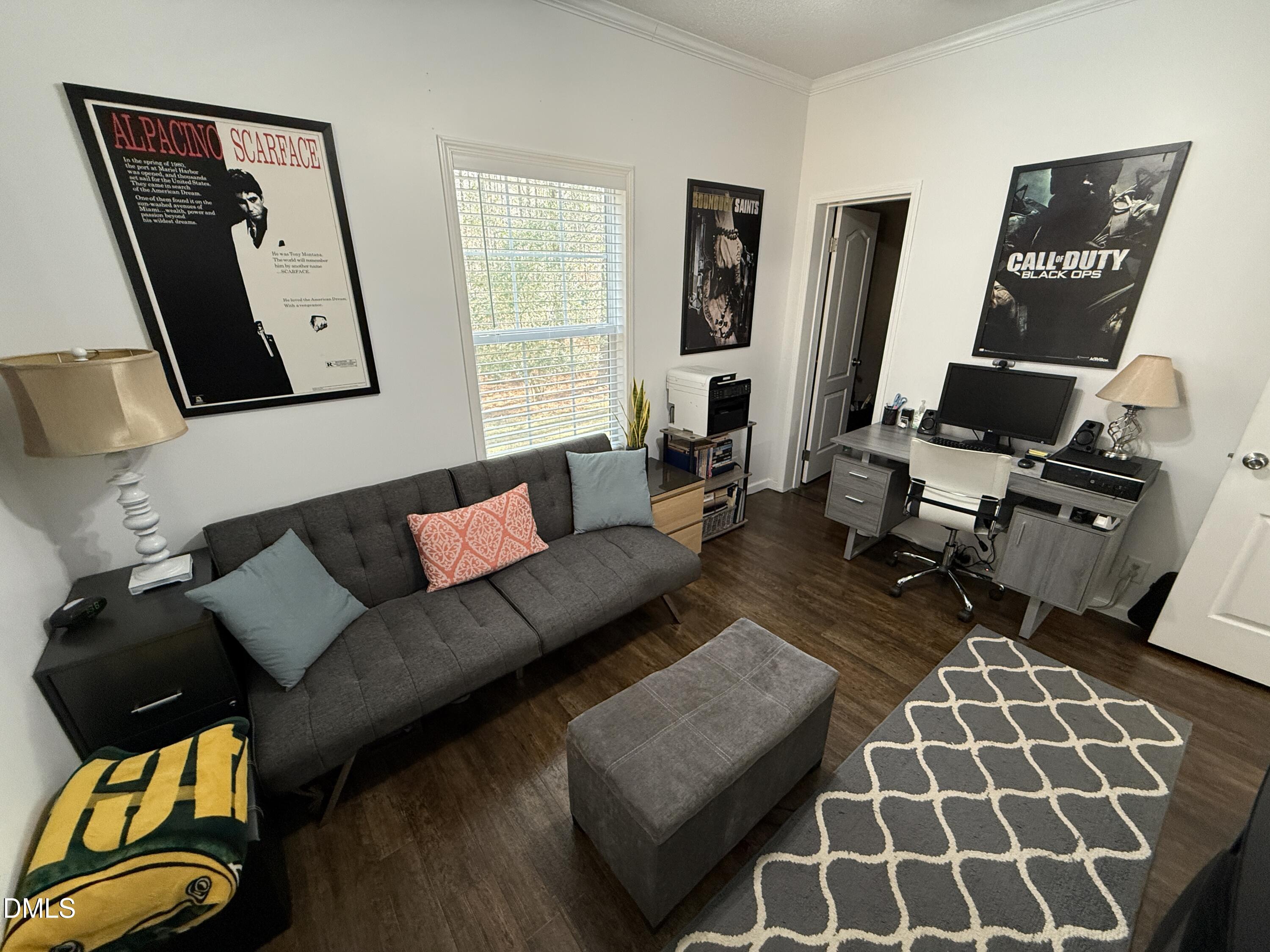 11242 Bissette Road Middlesex, NC 27557 - Photo 29 of 49 a living room with furniture and a flat screen tv