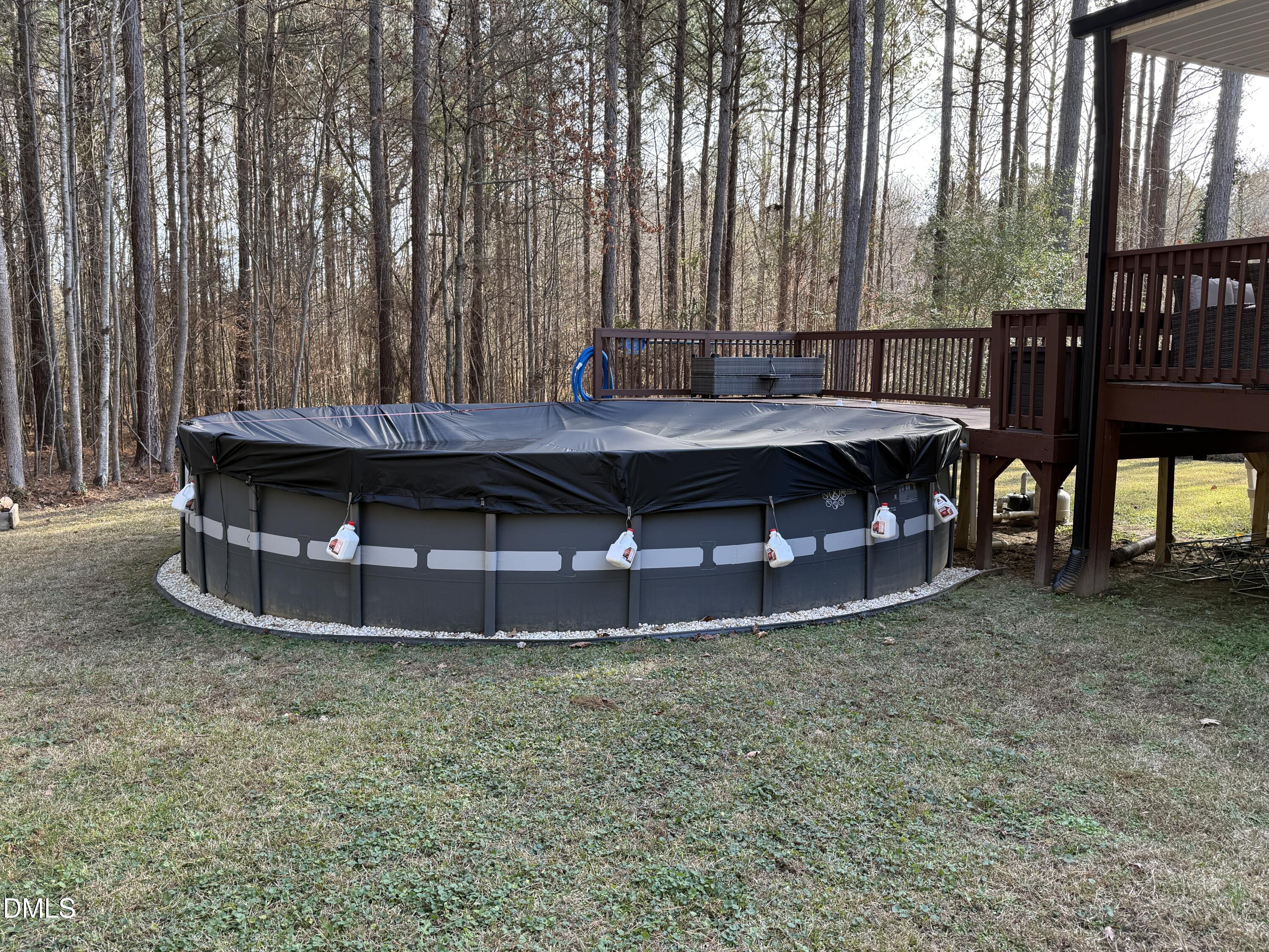 11242 Bissette Road Middlesex, NC 27557 - Photo 37 of 49 a view of a wooden deck