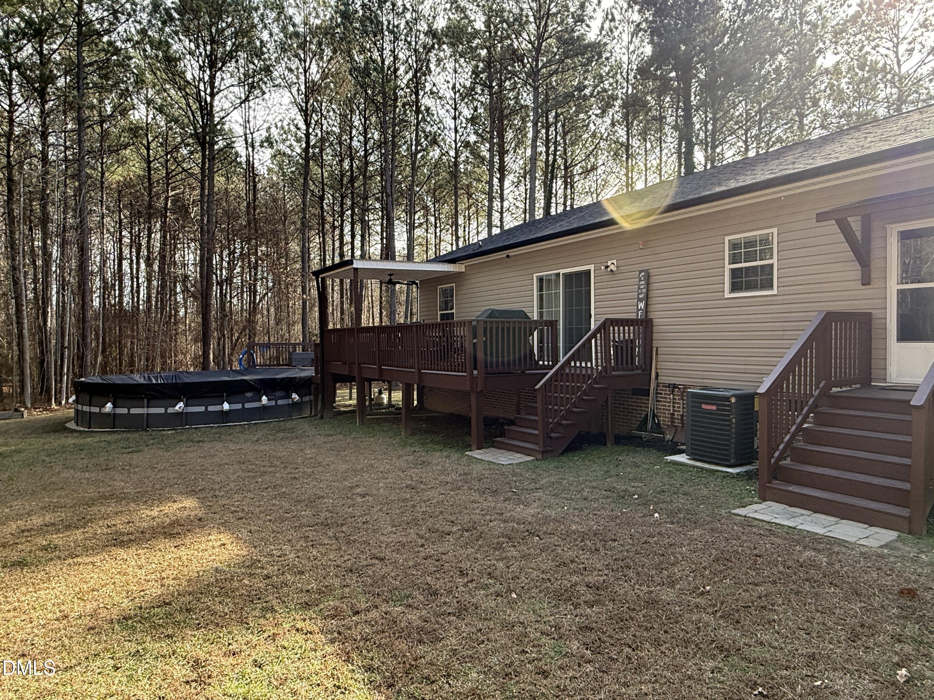 11242 Bissette Road Middlesex, NC 27557 - Photo 39 of 49 a view of a house with a yard