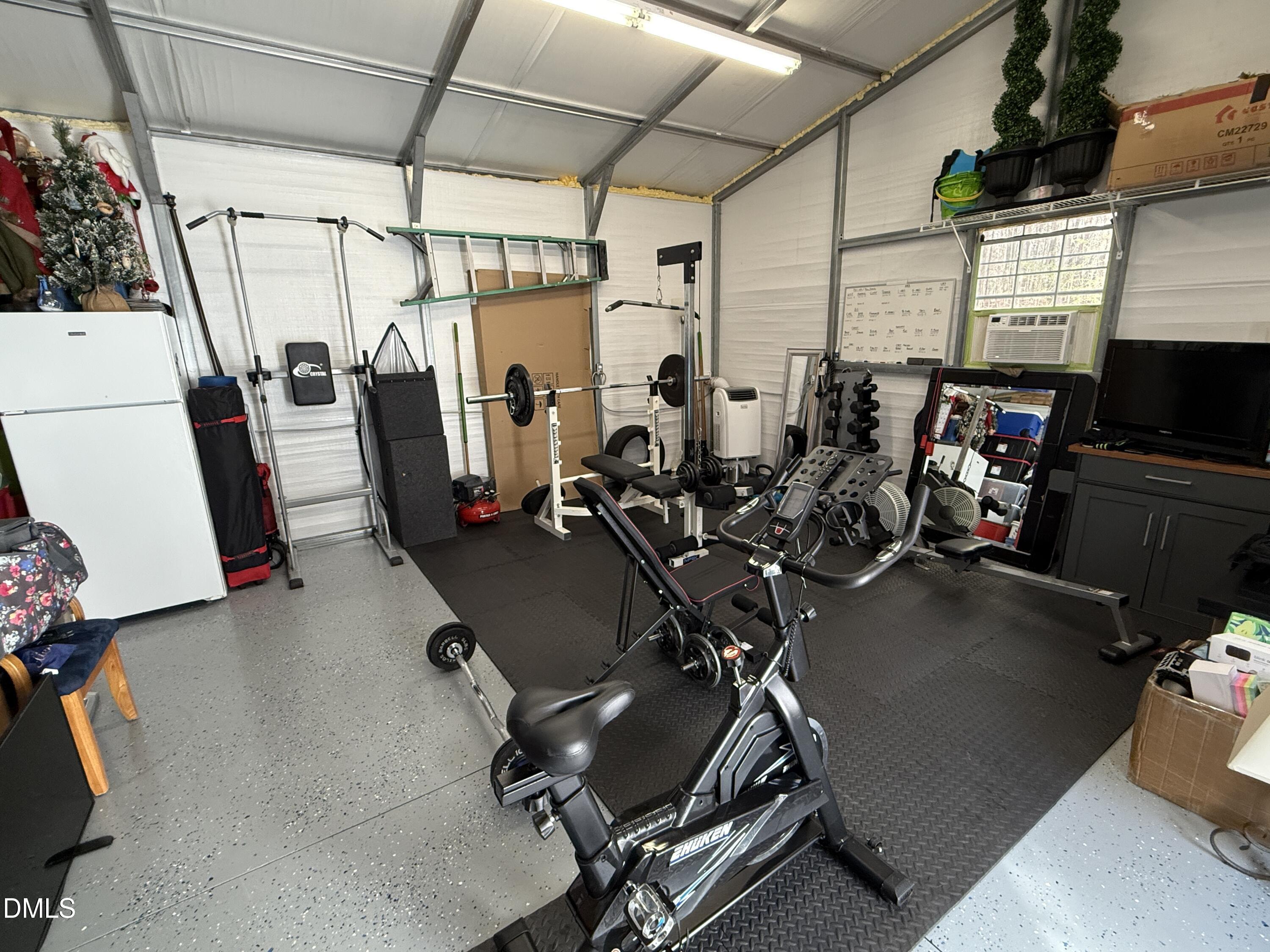 11242 Bissette Road Middlesex, NC 27557 - Photo 41 of 49 a view of a room with gym equipment
