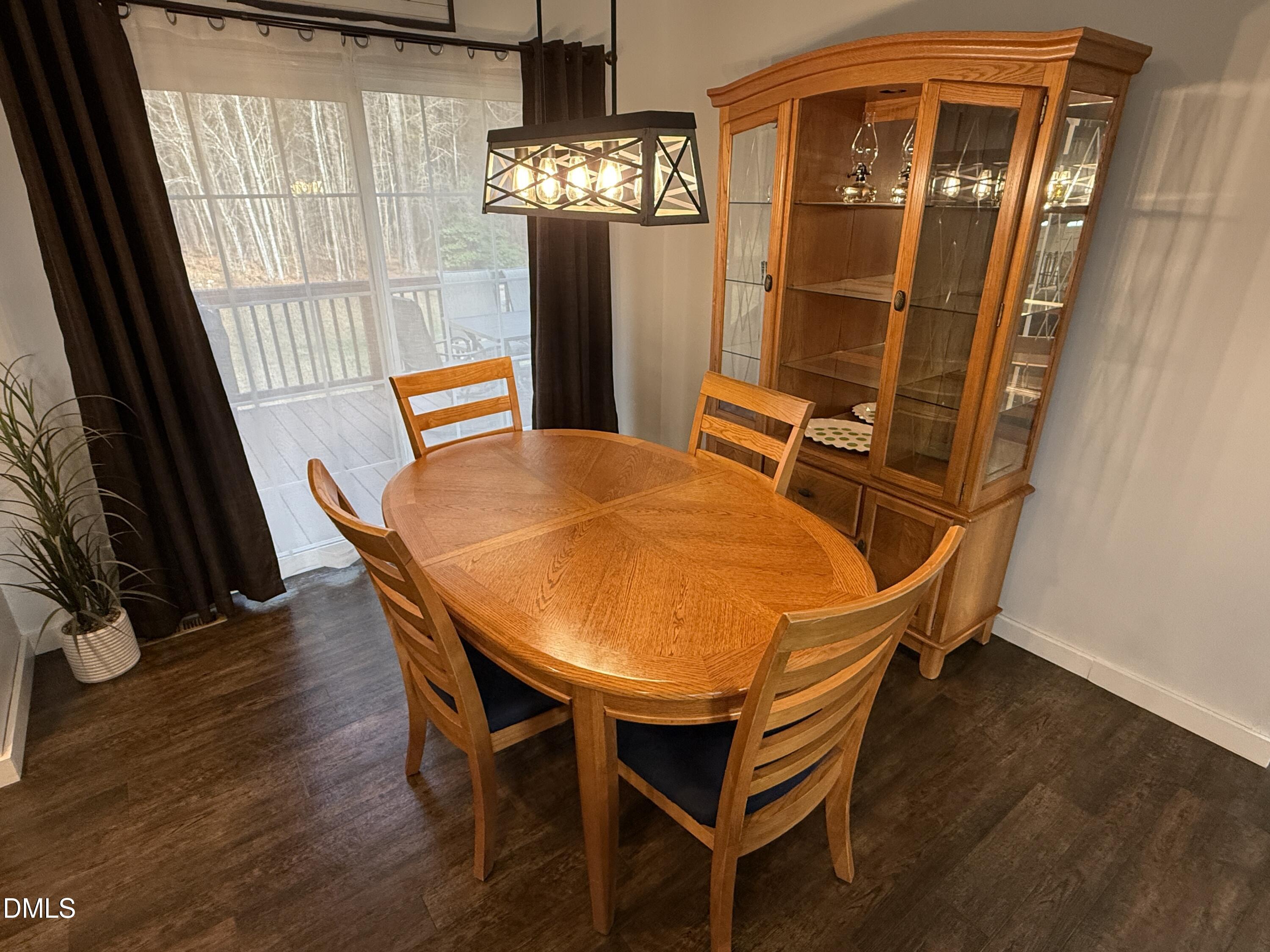 11242 Bissette Road Middlesex, NC 27557 - Photo 7 of 49 a dining room with furniture and window