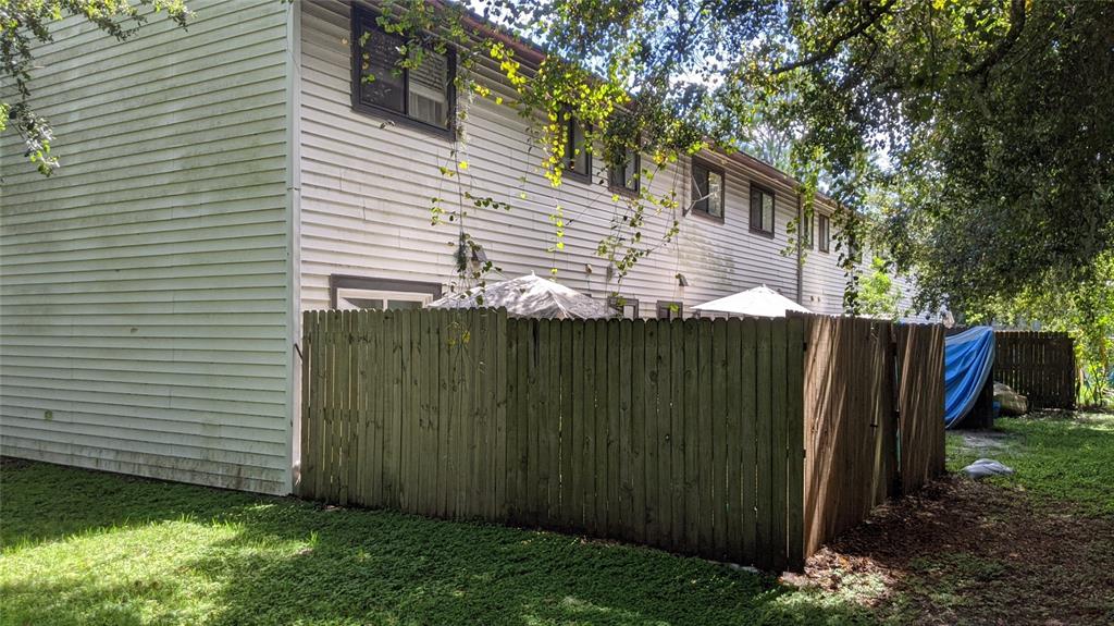 322 Canal Road, Unit D26 Edgewater, FL 32132 - Photo 9 of 9 a view of a backyard