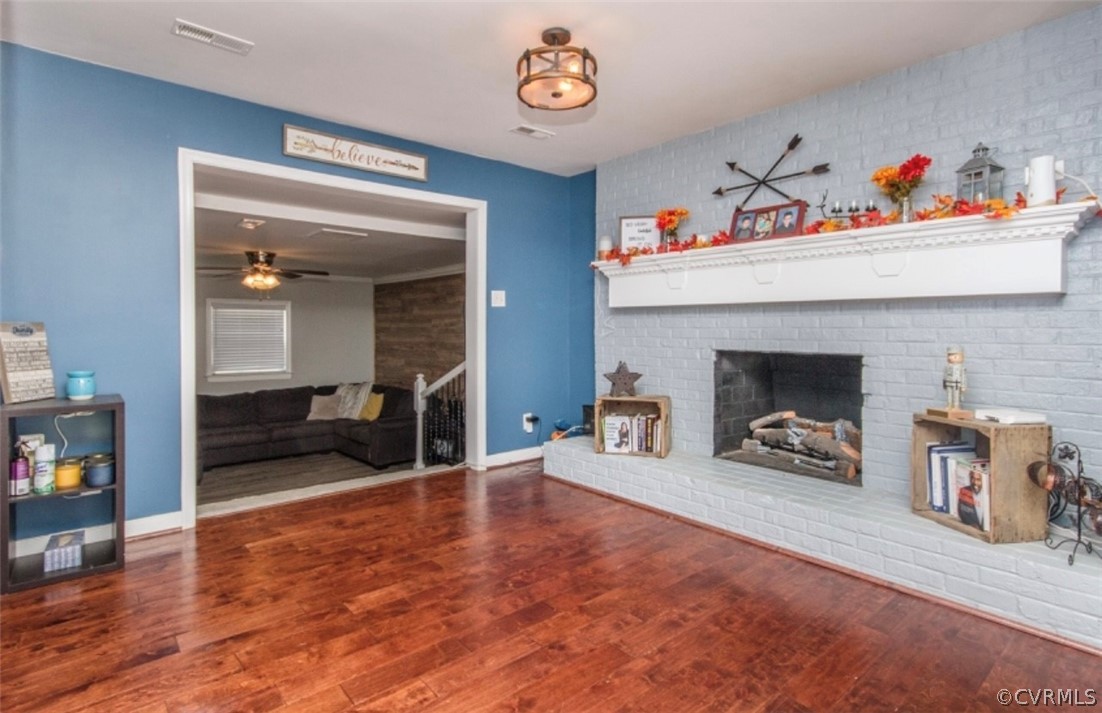 12906 Lewis Road Chesterfield, VA 23831 - Photo 11 of 22 a living room with furniture and a fireplace