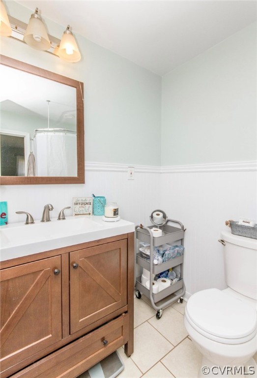 12906 Lewis Road Chesterfield, VA 23831 - Photo 15 of 22 a bathroom with a toilet a sink and a mirror
