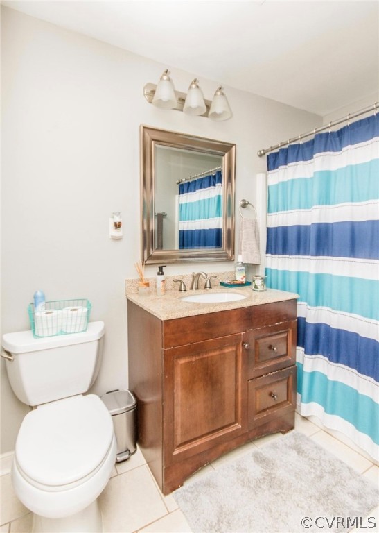 12906 Lewis Road Chesterfield, VA 23831 - Photo 4 of 22 a bathroom with a sink and a mirror