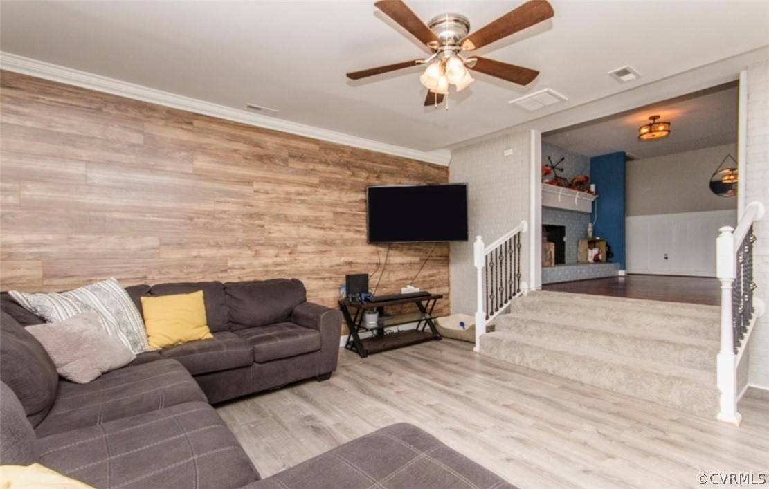 12906 Lewis Road Chesterfield, VA 23831 - Photo 5 of 22 a living room with furniture and a flat screen tv