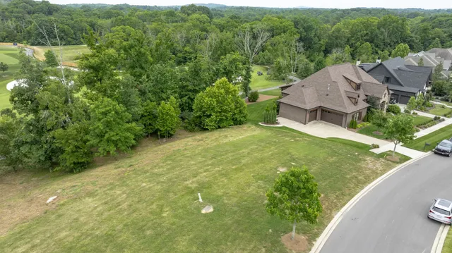 a view of a garden from a balcony