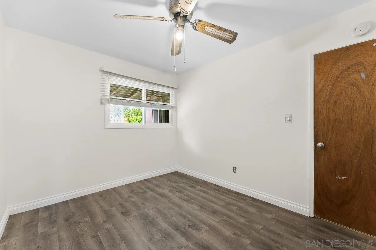 582 Macon Street El Cajon, CA 92019 - Photo 17 of 34 a view of empty room with wooden floor and fan