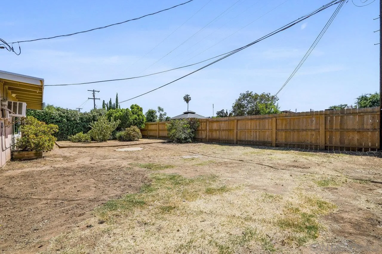 582 Macon Street El Cajon, CA 92019 - Photo 26 of 34 a view of backyard with wooden fence