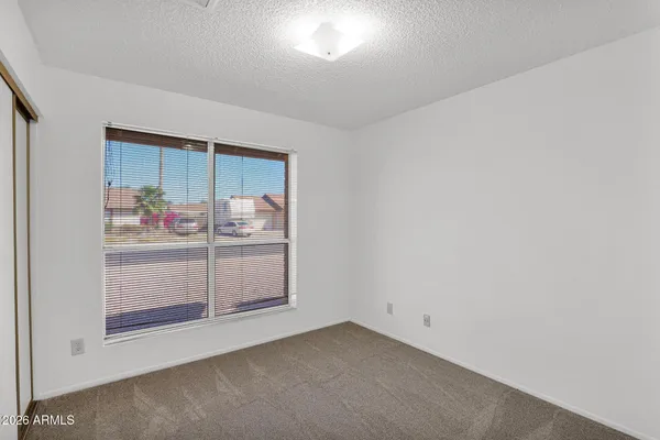 an empty room with cabinet