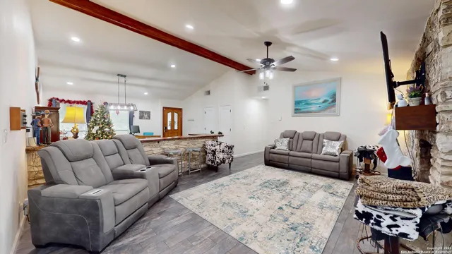 a living room with furniture and a couch