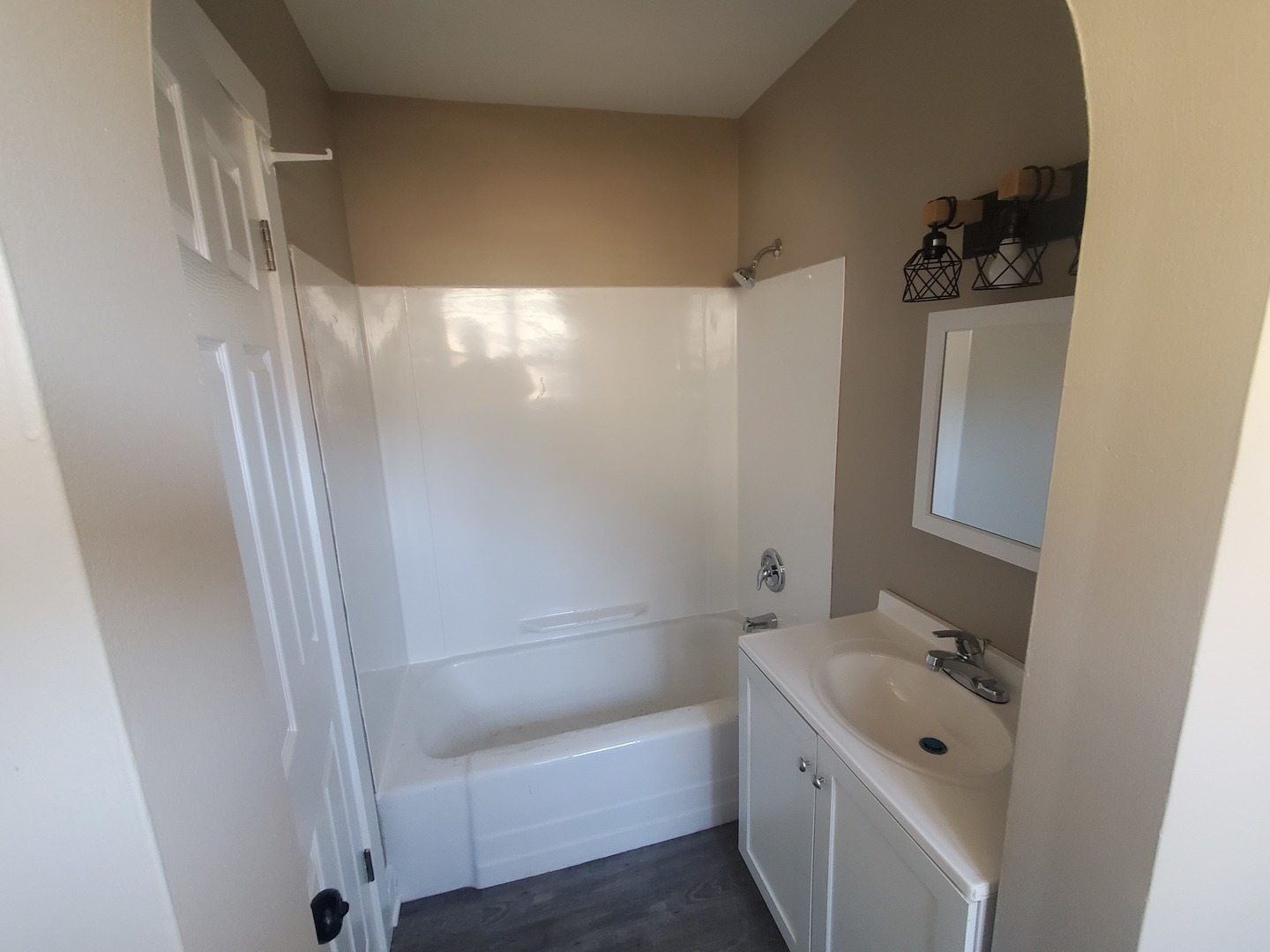 11606 Prairie Avenue Hebron, IL 60034 - Photo 13 of 14 a bathroom with a tub sink and mirror