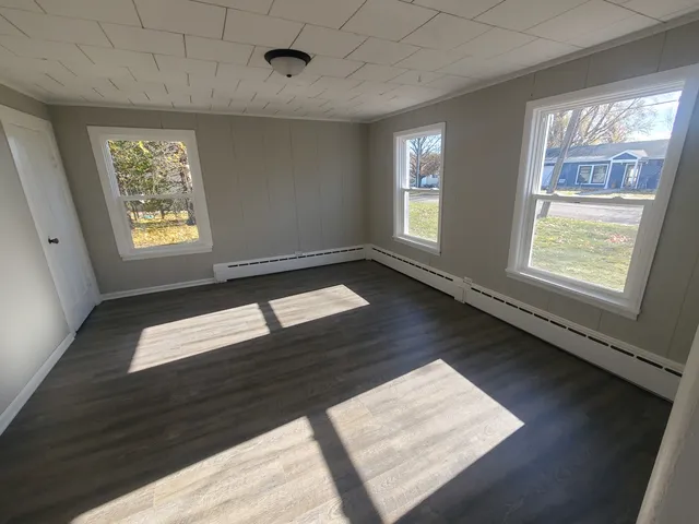 a view of an empty room and window