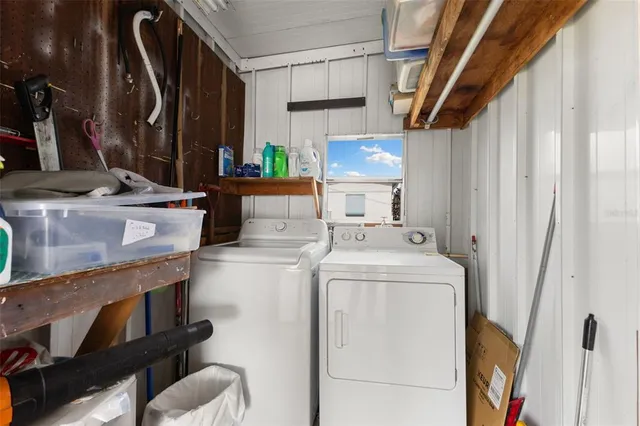 a view of living room with washer and dryer