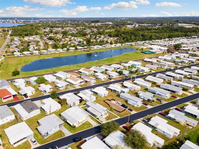an aerial view of residential building and lake view