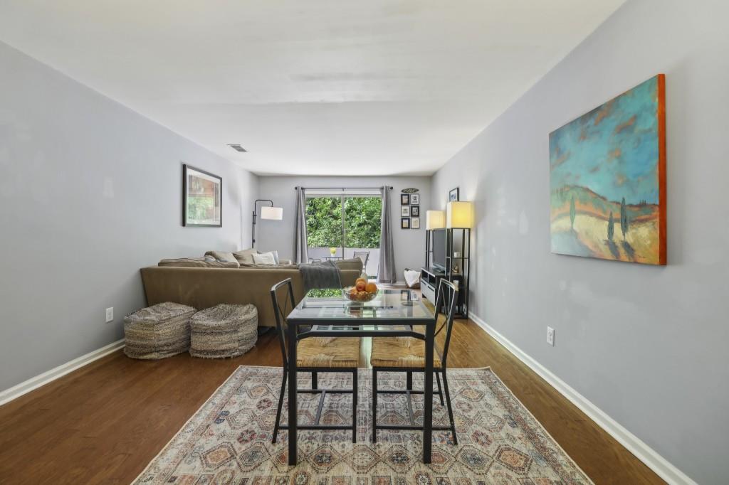 5400 Roswell Road, Unit H5 Atlanta, GA 30342 - Photo 17 of 26 a living room with furniture and a window