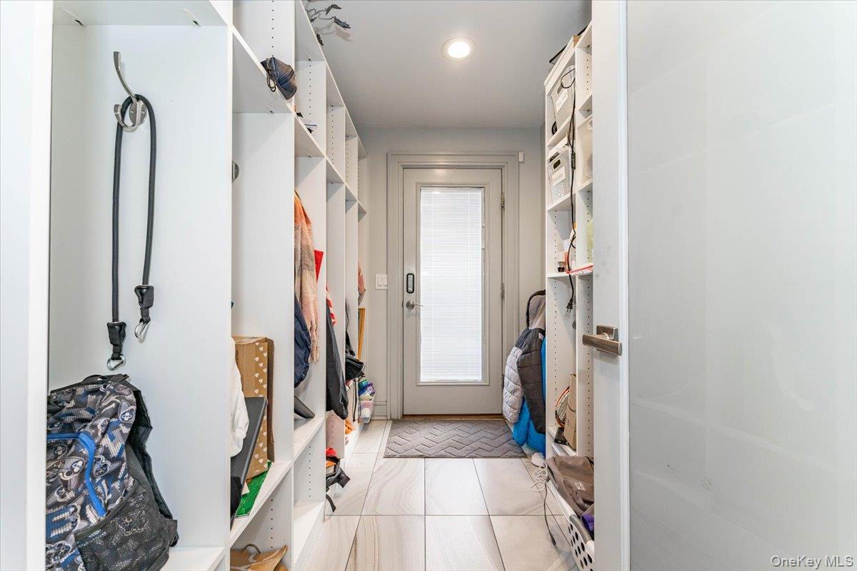 22 Larch Hill Road Lawrence, NY 11559 - Photo 14 of 31 a view of walk in closet