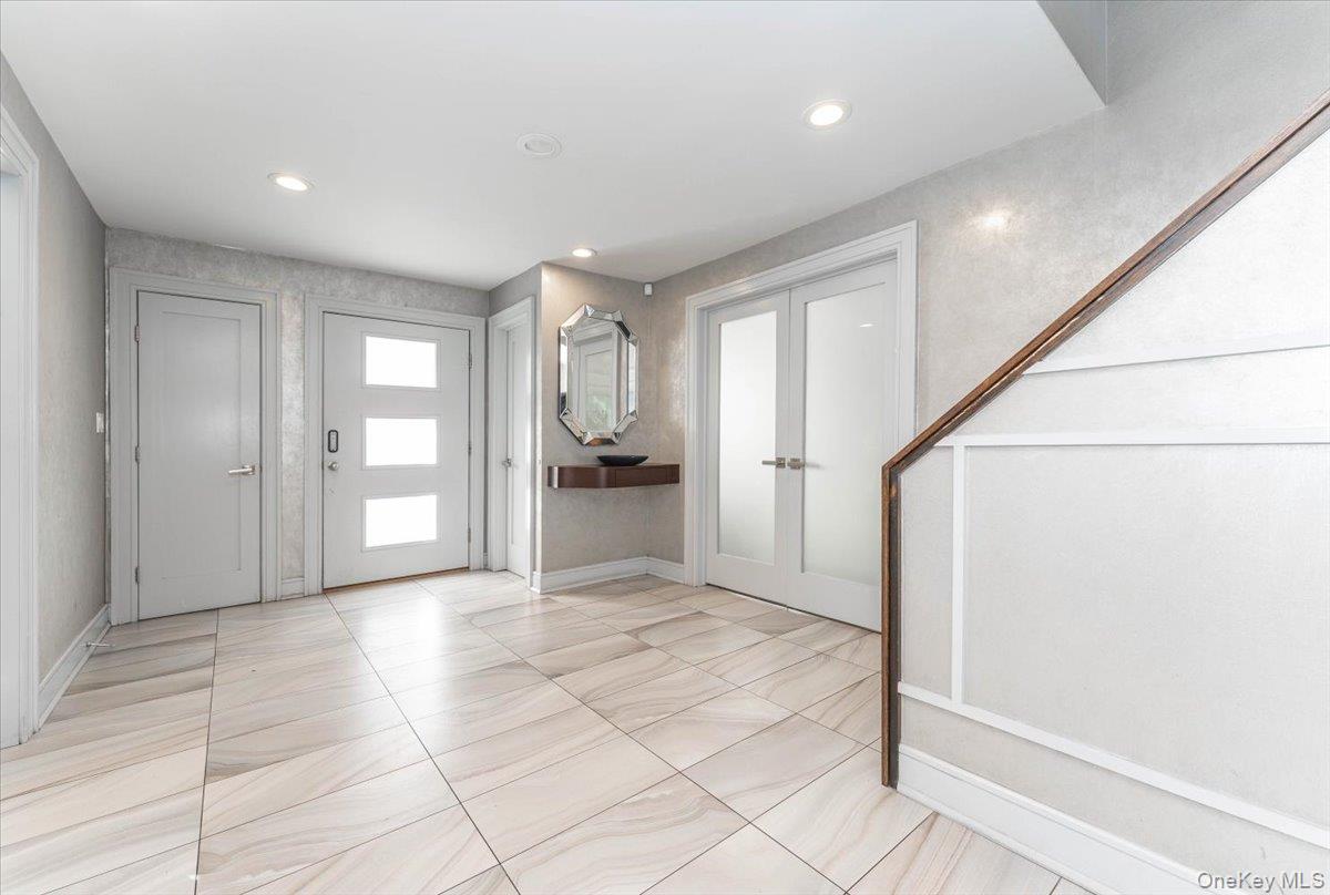 22 Larch Hill Road Lawrence, NY 11559 - Photo 2 of 31 a view of entryway with bathroom