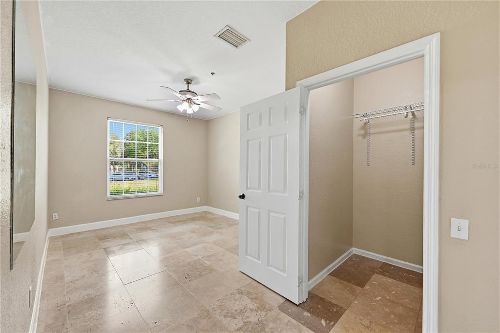 580 Brantley Terrace Way, Unit 104 Altamonte Springs, FL 32714 - Photo 20 of 32 a view of an empty room with a window