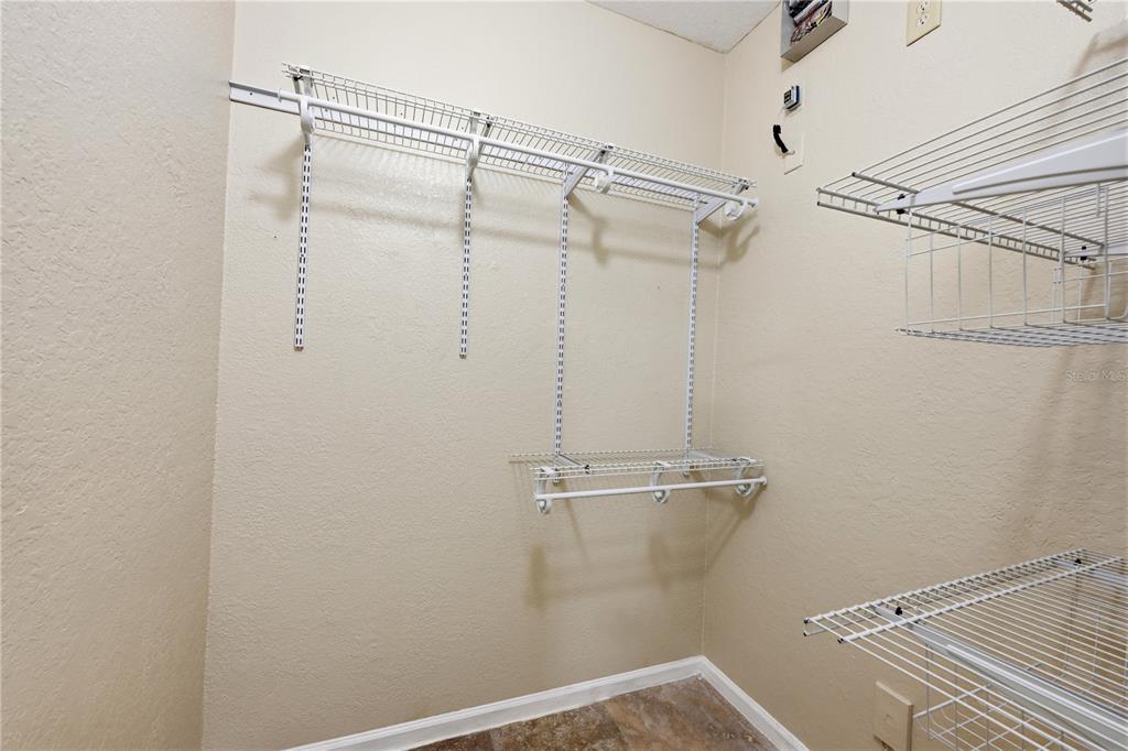 580 Brantley Terrace Way, Unit 104 Altamonte Springs, FL 32714 - Photo 22 of 32 a view of a room with racks on the wall