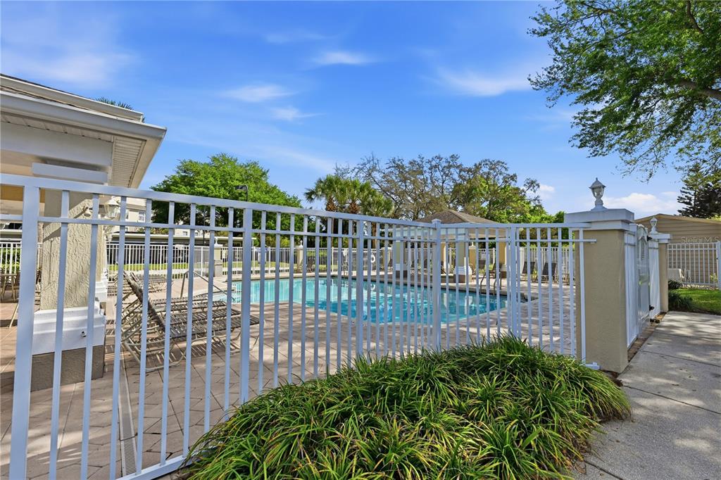 580 Brantley Terrace Way, Unit 104 Altamonte Springs, FL 32714 - Photo 31 of 32 a view of a balcony with iron fence