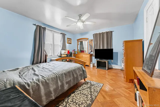 a view of a livingroom with wooden floor