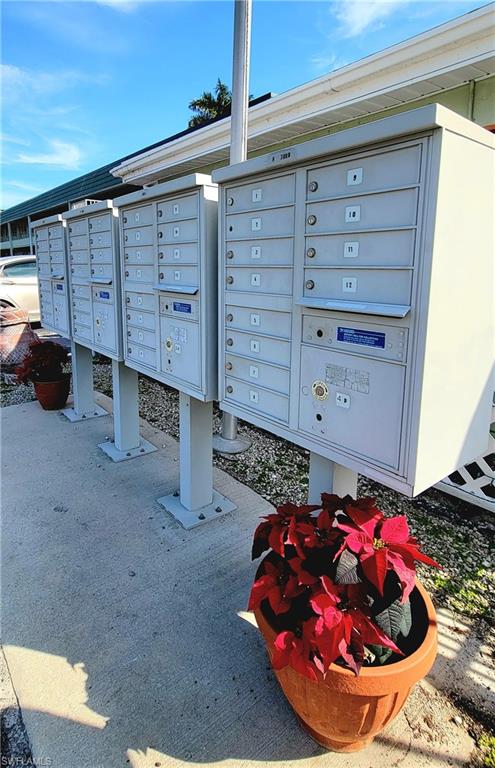 300 Valley Stream Drive, Unit A7 Naples, FL 34113 - Photo 11 of 34 a view of a closet with storage
