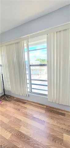 a kitchen with cabinets a sink and stainless steel appliances