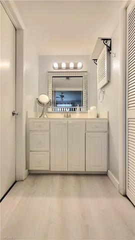 view of a kitchen with a sink